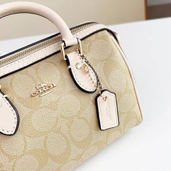 COACH Rowan Satchel in Blocked Signature Canvas - Timeless Elegance with Gold-Tone Hardware