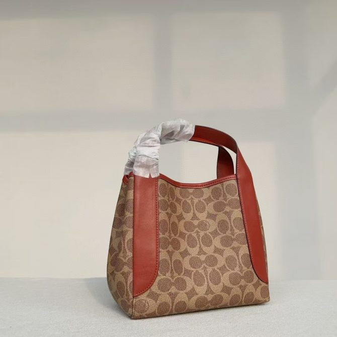 COACH Hadley Hobo Bag - Signature Canvas with Red Leather Trim